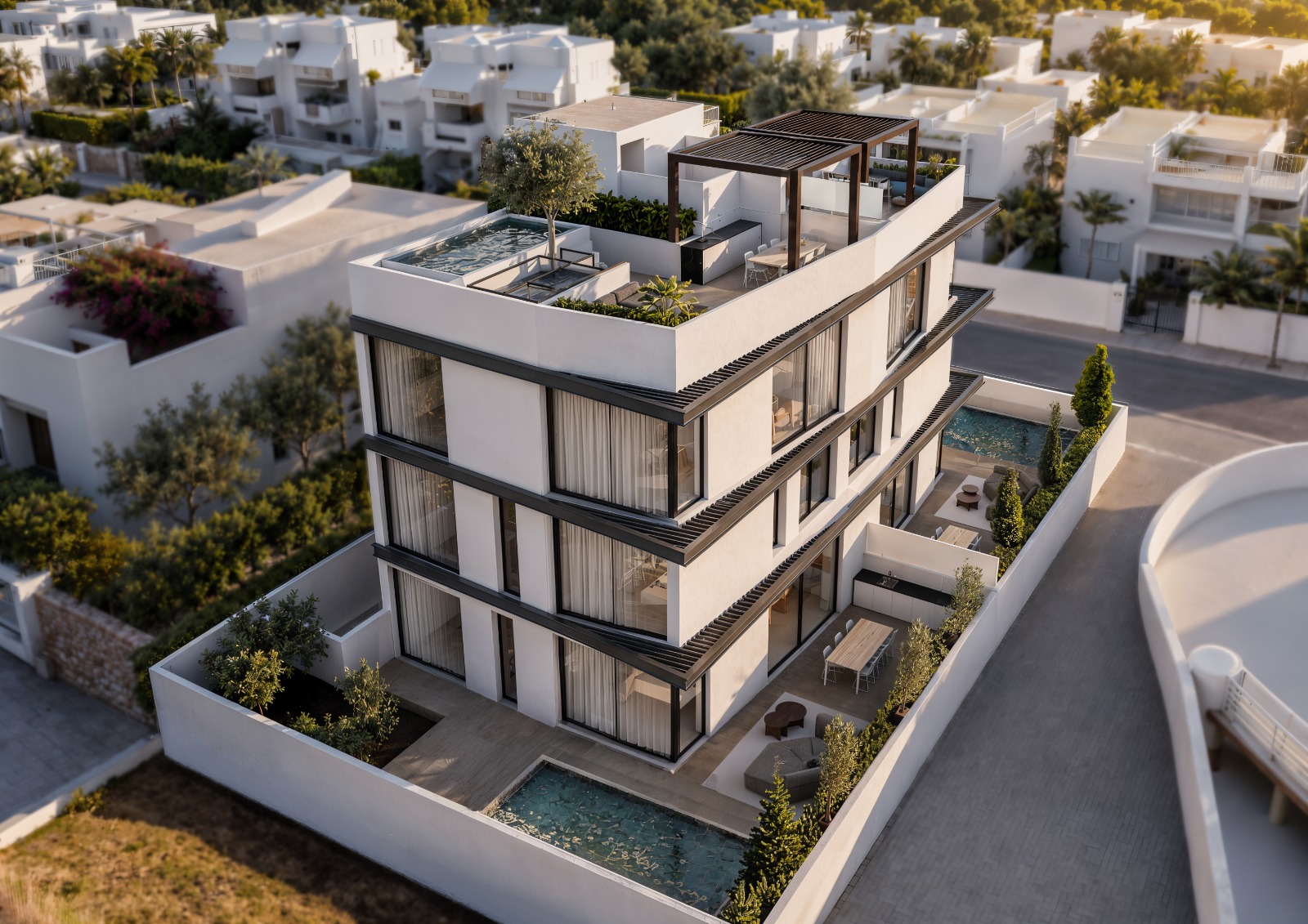 Vista aérea del edificio: solárium con plunge pool y jardines con piscina privada